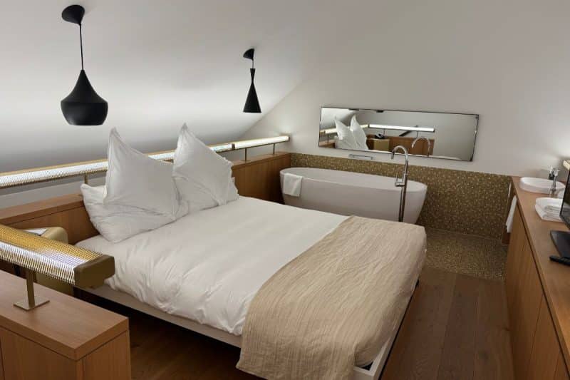 Bedroom on mezzanine level of a suite at B2 Hotel in Zurich