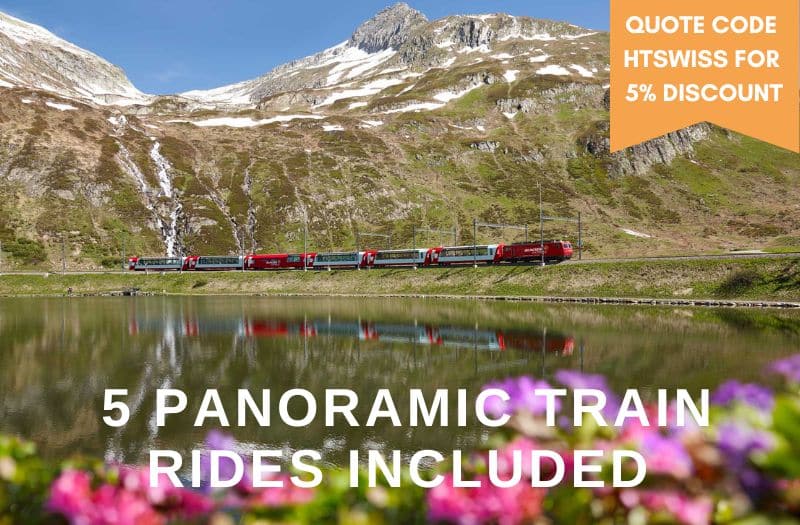 Glacier Express train passing by a lake in Switzerland