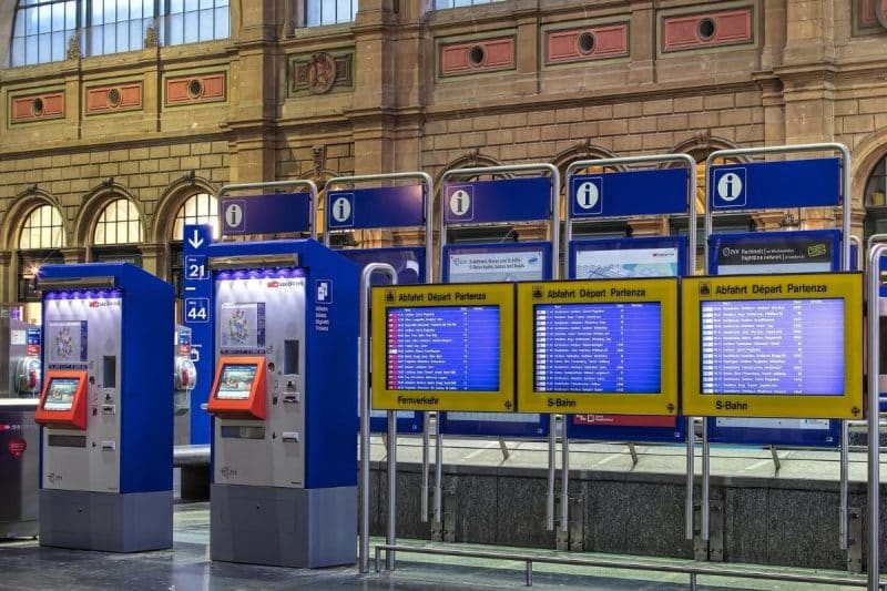 Ticket machines and information boards inside Zurich main railway station