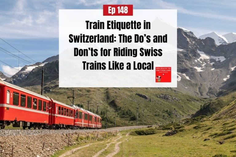 Red train travelling in mountainous countryside
